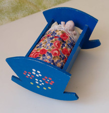 Vintage Rocking Crib with Baby