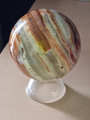 Polished stone sphere with - polished,