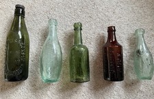 5 old vintage beer bottles in great condition 
