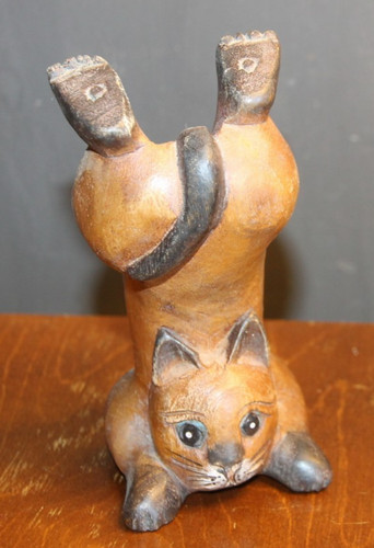Carved wooden cat handstanding - cat,