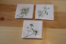 THREE lovely hand made ceramic wildflower coasters by LR ceramics