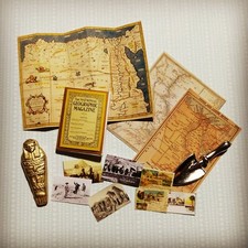 EGYPTIAN statue maps books