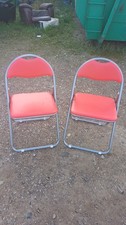 A Pair Of Metal Framed Red Padded Seat Folding Chairs - Spare Christmas Chair