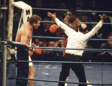 Referee John Coyle stops the