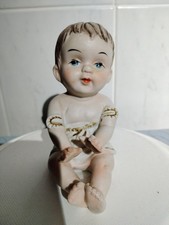 Bisque Piano Baby Seated