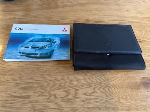Mitsubishi colt owners manual - mitsubishi,