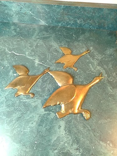 Three brass wall hanging ducks - wall,