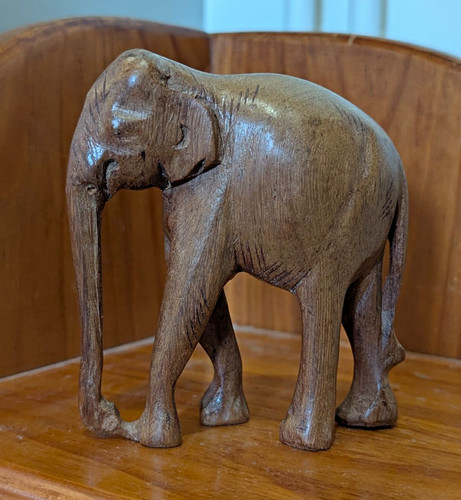 Hand carved wood elephant - hand,