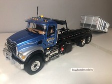 First Gear Waste Management Mack roll on off 1.34 scale (used)