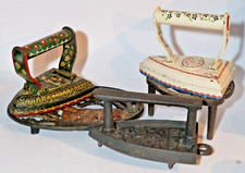 LOT OF VINTAGE CAST IRON TRIVETS & FLAT IRONS BARGE WARE SHEEP & JARDINIER