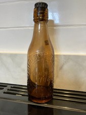 Carlisle New Brewery vintage brown beer bottle. Including free screw bottle top