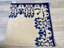 the rug company , cream and