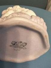 Pale lilac and white decorative jug.