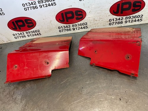 Pair lower dash corner - of,