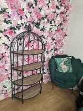 tall black iron bird cage bookcase shelving cabinet unit.