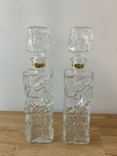 2 decorative glass bottles with stopper
