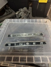 Singer Badges Removed From