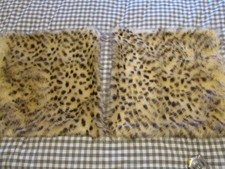 TWO Dunelm Faux Leopard Fur