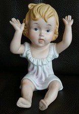 Bisque Porcelain Piano Baby