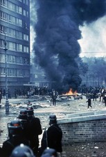 Police riot gear watch from a