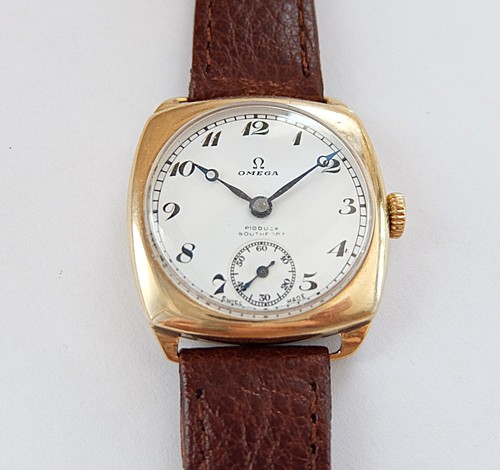 1937 gold omega - gold,