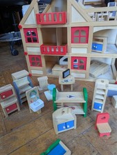 wooden doll house used with furniture German made