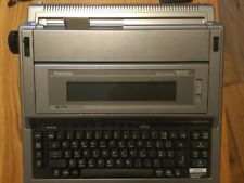  Word processor, manual, 5 floppy disks, 2 correctable carbon tape 1 lift off ta