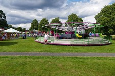 Photo A2 Fairground, Pirbright Village A roundabout on the green during  c2016