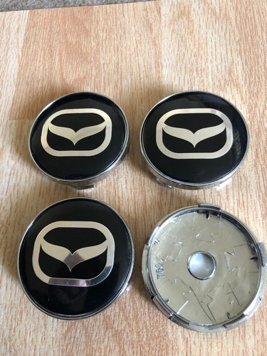 Mazda alloy wheel centre - mazda,