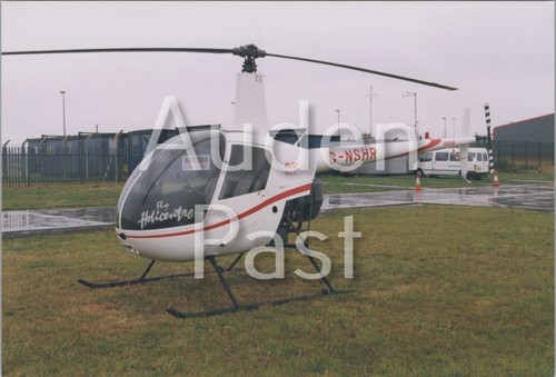 The helicopter robinson r22 - helicopter,
