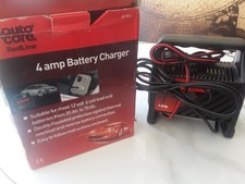 4 AMP BATTERY CHARGER, NEW.