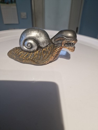 Alien snail figures garden - alien,