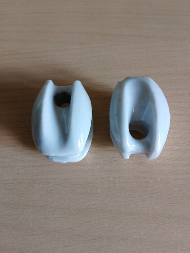 Pair ceramic egg insulators - ceramic,