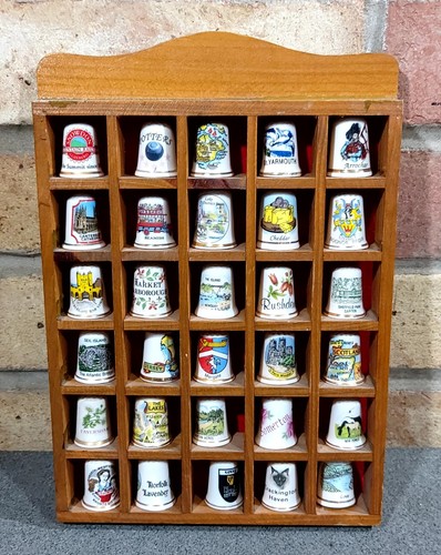 Thimble display case with - thimble,