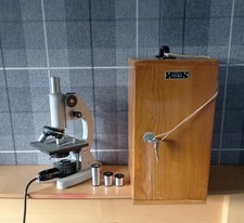 Vintage XSP-02 Microscope With Electric Light Source And Accessories 125x 10x 5x