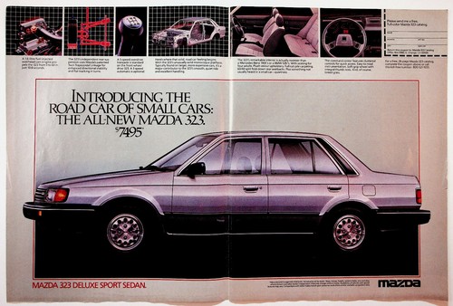 Mazda 323 deluxe sport sedan - 323,