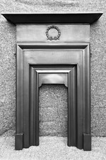 ANTIQUE CAST IRON FIREPLACE