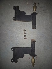 Fire grate decorative front supports  and a set of legs, I think. (N.Lincs)