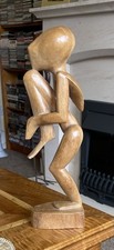 Carved Wooden Statue Of Man In