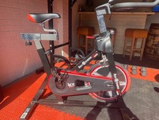 WE*R Sports 'Rev Xtreme' S1000 Exercise Bike in black and red