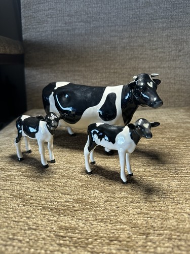 Beswick friesian cow and two - friesian,