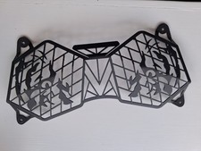 Triumph Tiger Explorer 1200 Headlight Guard (2012-2017, Halogen Bulb Unit).