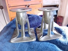 Archibald Knox for Liberty & Co. a Pair of Tudric Pewter Candlesticks