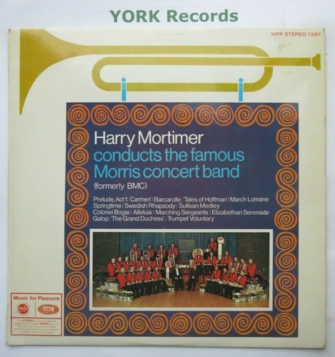 Harry mortimer conducts the - conducts,