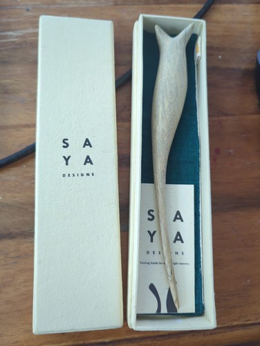 Saya designs the - saya, "the