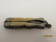 (ref1BI) Antique folding mother of pearl scissors boot shaped