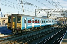 PHOTO  CLASS 3174-CAR EMU NO 317 888 (EX-NO 317 331) IN A HYBRID NXEA/REVISED ST