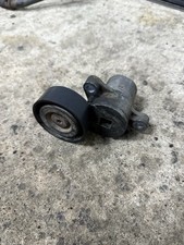 DRIVE BELT TENSIONER FOR FORD