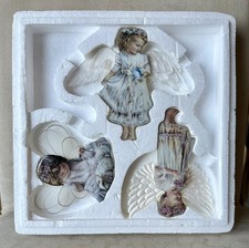 The Bradford Editions Heaven‘s Little Angels Christmas Ornament Collection Set