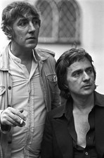 British comic actors Dudley Moore Peter Cook standing in a backyar- Old Photo